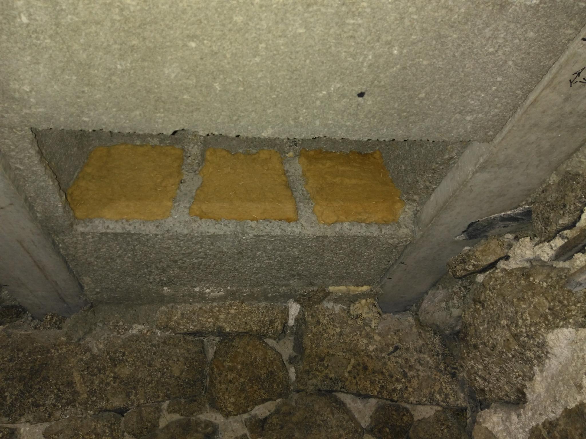 Remplissage des hourdis d'isolant