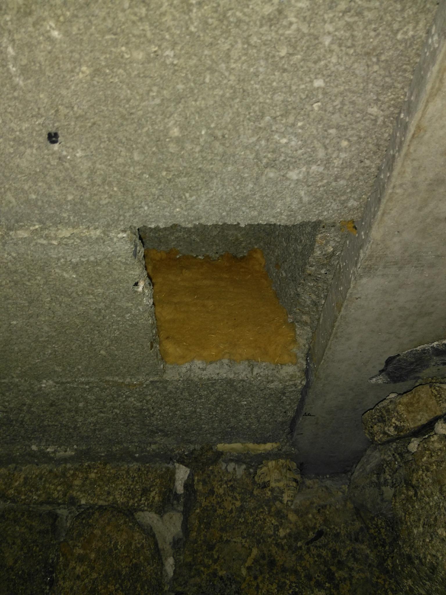 Remplissage des hourdis d'isolant